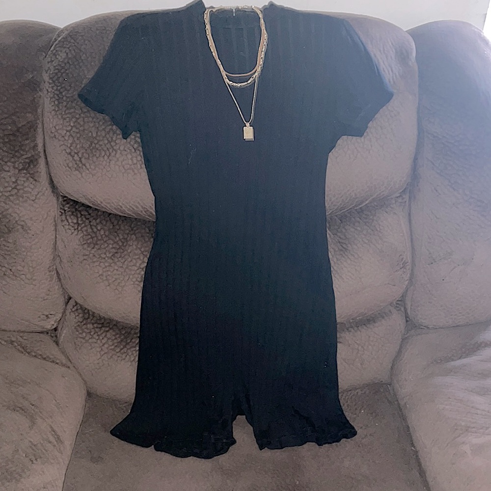 I’m sleeping this all black romper.